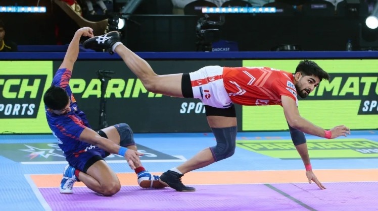 Gujarat’s Parteek Dahiya was the top raider