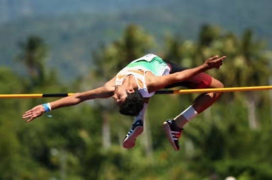 Tejaswin Shankar doing high jump Tejaswin Shankar doing high jump